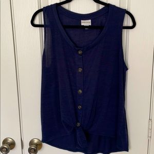 Navy top with tie waist and large buttons.